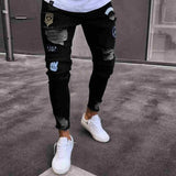 Men Stretchy Ripped Skinny Jeans Biker Embroidery Print High Quality Jeans Destroyed Hole Taped Slim Fit Denim Scratched